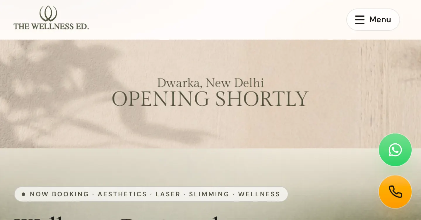 The Wellness Ed homepage — calm, sandstone-toned hero with the wellness brand mark